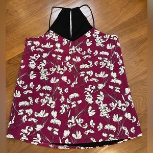 Reversible tank top. One side all black and other side burgundy and white floral